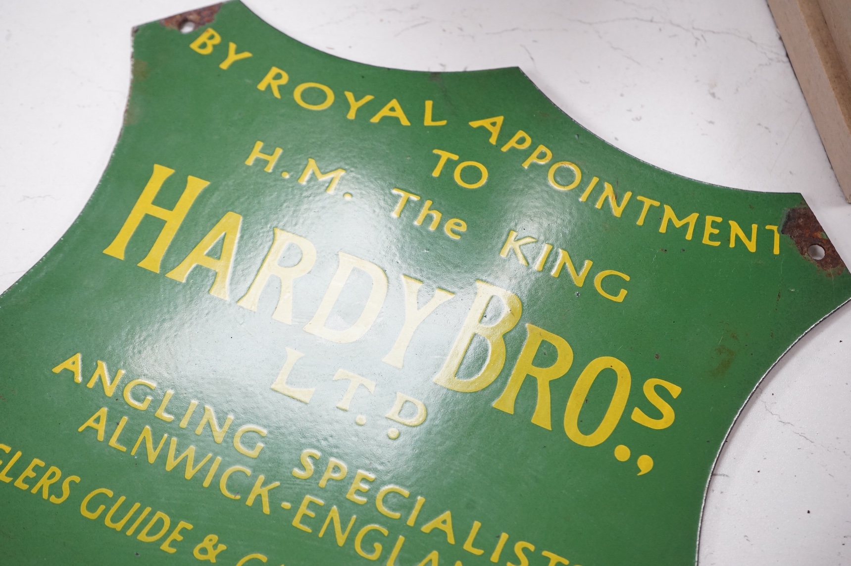 An enamel advertising shield for Hardy Brothers Ltd. angling specialists, 30cm high
